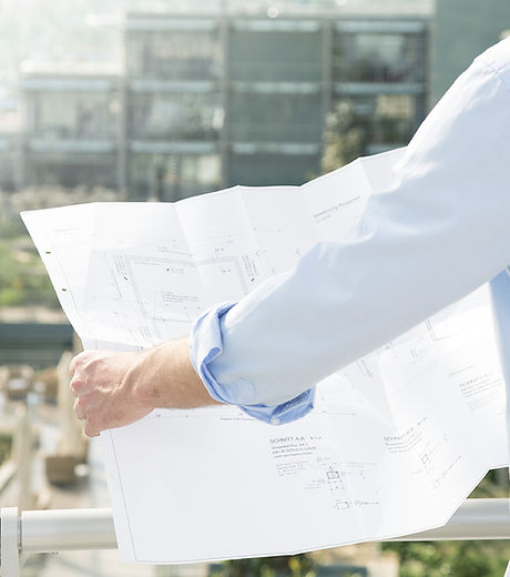 Architect hold plans