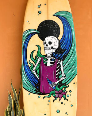 Skeleton with tank top standing in front of a wave, painted on a surfboard.