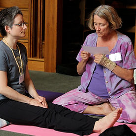 students practing Yoga Nidra script with Kamini Desai at the Amrit Yoga Institute
