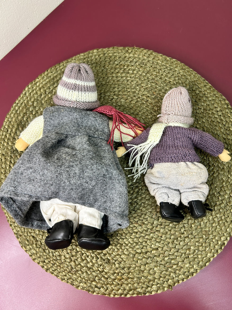 Thumbnail: Porcelain and Cloth Body Dolls Sitting On Decorative Bench Winter Decor