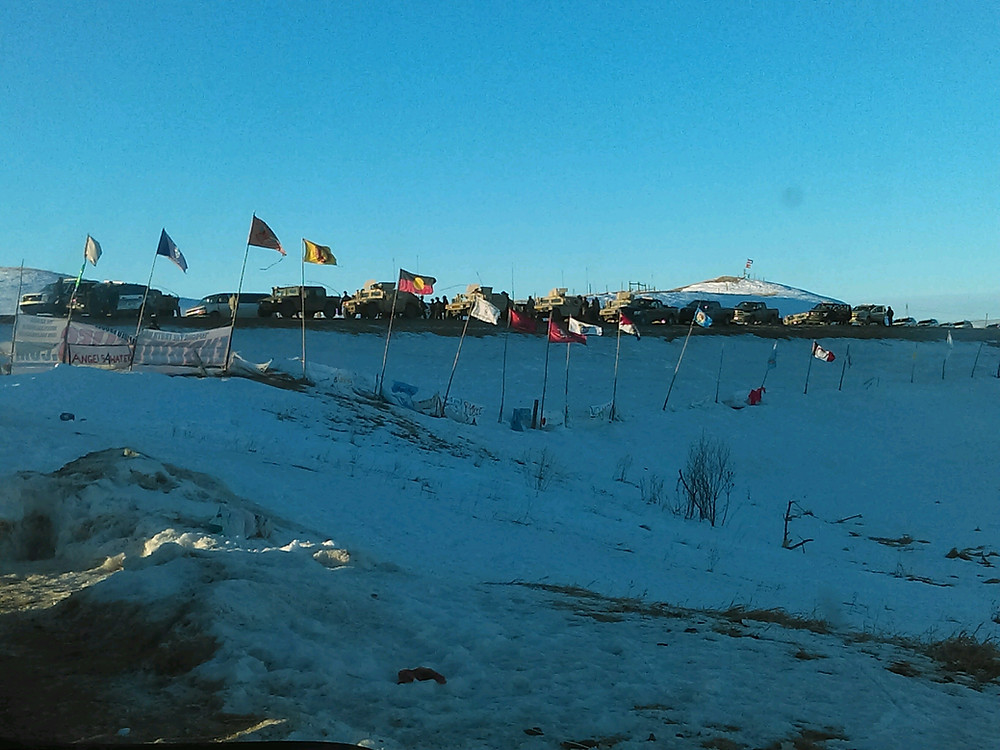 Sheriff and police humvees on Hwy 1806, Standing Rock, Photo: Riley Redhorse