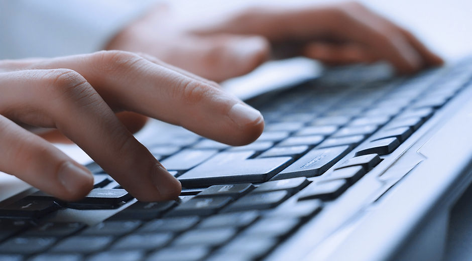 Man Hands On Keyboard