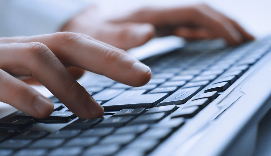 Man Hands On Keyboard