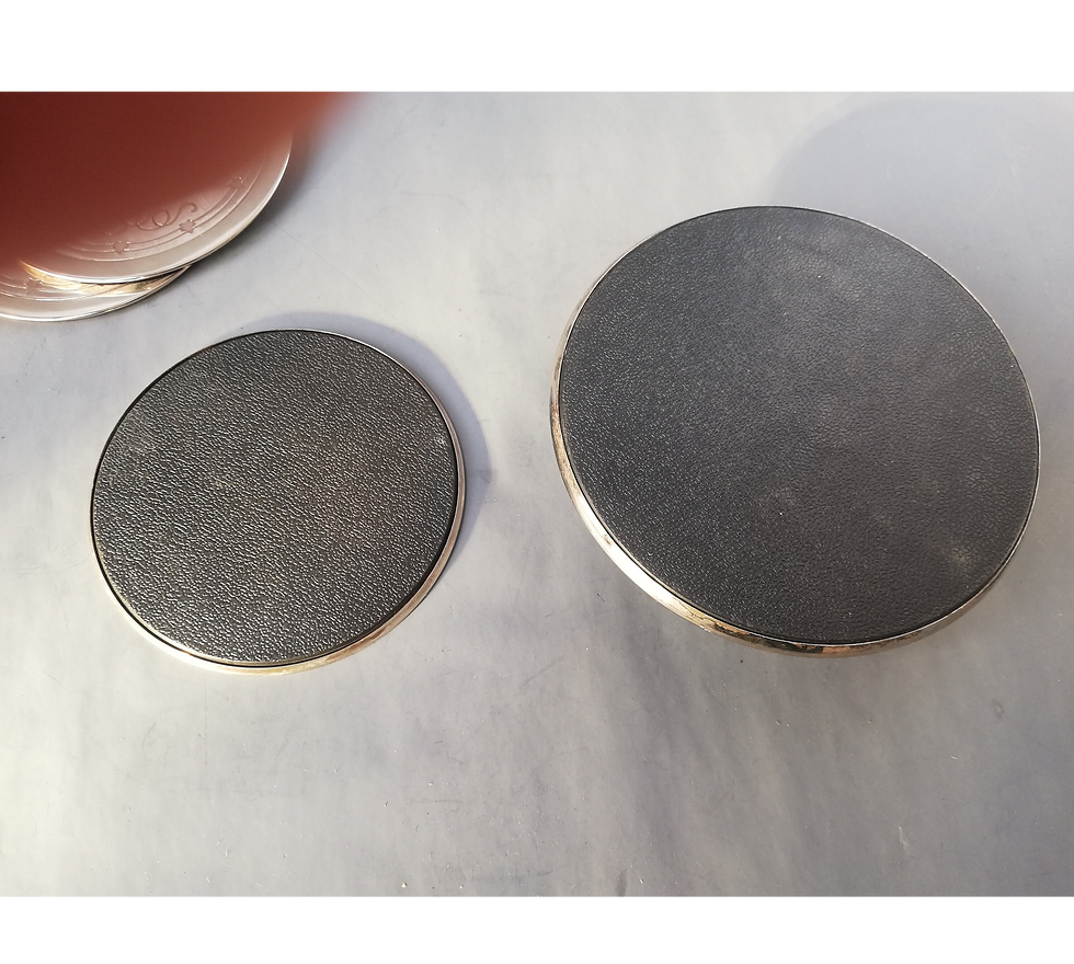 Thumbnail: A set of six mirrored vintage wine coasters with holder. 