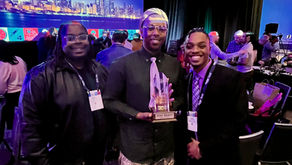 Three Arkansas RAPPS team members celebrate with the second place award at a vibrant conference, capturing the energy and excitement of the NMAC Biomedical HIV Prevention Summit in Chicago.