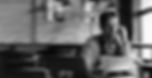 mid-adult-bar-owner-analyzing-documents-talking-mobile-phone-after-working-hours.jpg
