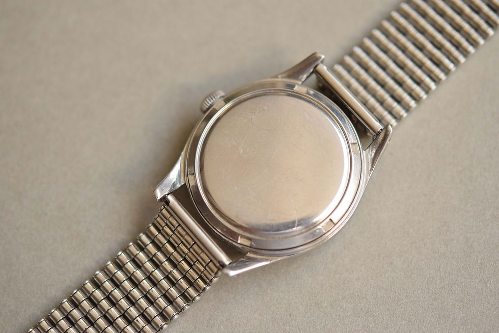 Thumbnail: 1950s Omega Calatrava Salmon Dial