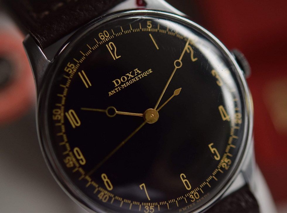 Thumbnail: 1940a Doxa Gilt Swan Neck hands