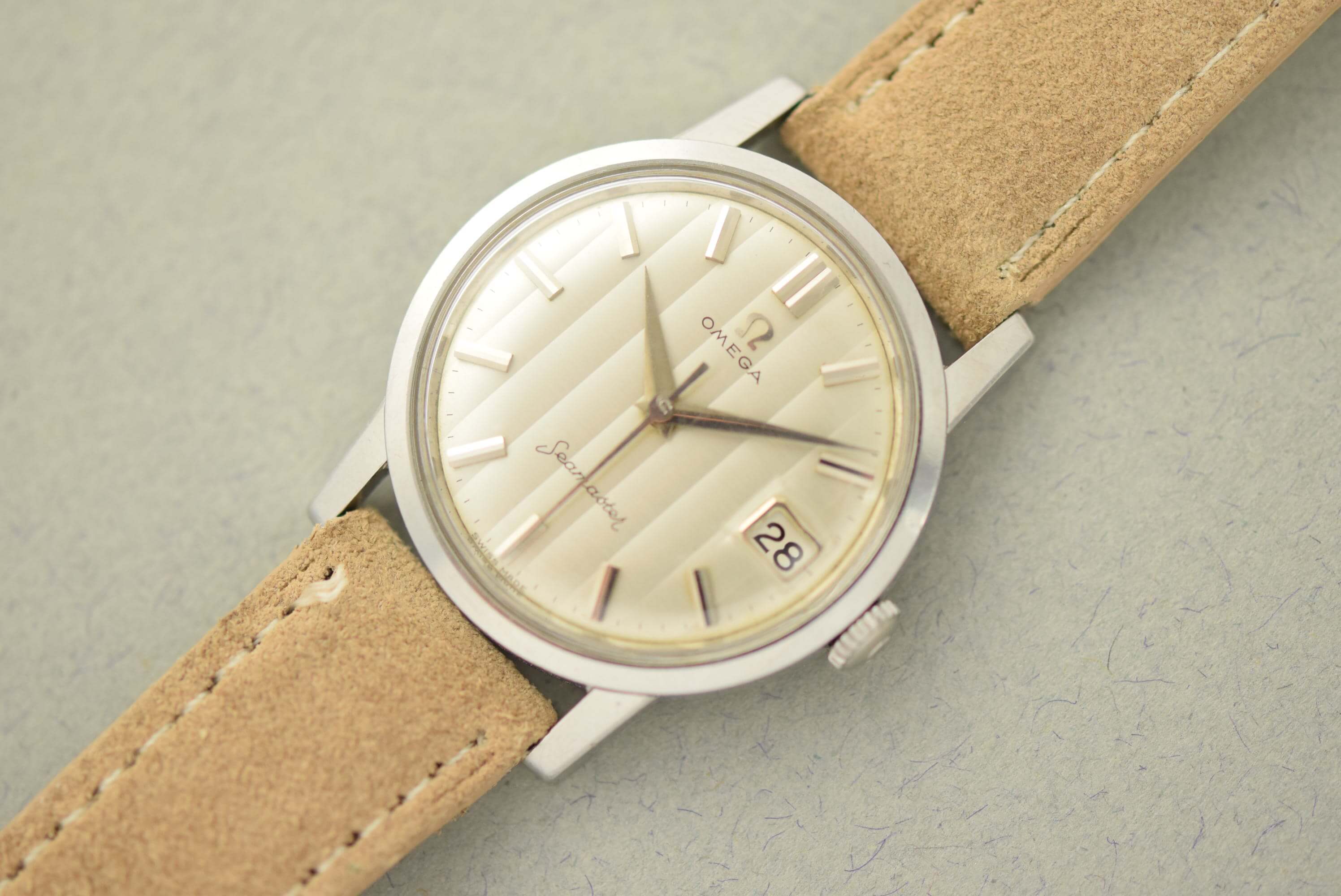 Omega Seamaster 14384. Angled ribbon-wave dial. · Photo: Vision Vintage Watches · © Vision Vintage Watches; permission not yet confirmed · Source: https://www.visionvintagewatches.com/product-page/1961-omega-seamaster-ribbon-dial-14384