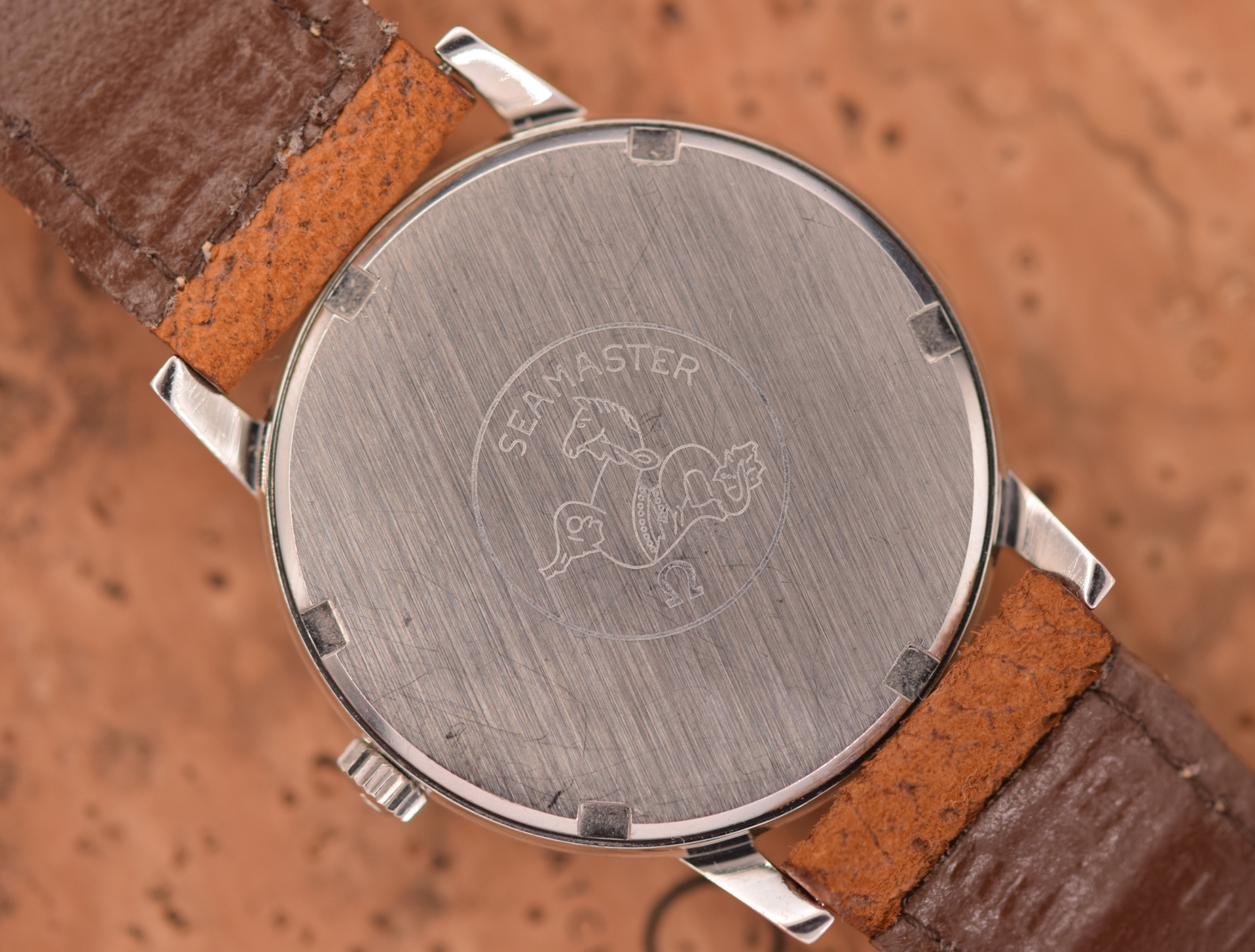 Omega Seamaster 135.011. External Seamaster caseback. · Photo: Vision Vintage Watches · © Vision Vintage Watches; permission not yet confirmed · Source: https://www.visionvintagewatches.com/product-page/1965-omega-seamaster-600-full-arabic