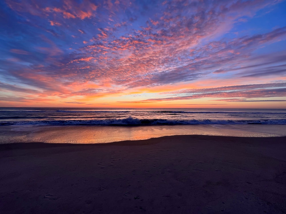 Sunrise at the beach on a rainbow of colors