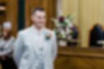 Groom smiling before wedding ceremony at Wandsworth Town Hall
