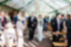 Bride walking down the aisle with her father at wedding at Syrencot in Wiltshire