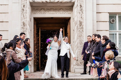 Brides cheering outside Wandsworth Town Hall