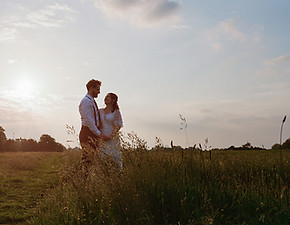 Bride and groom on Blackheath at sunset