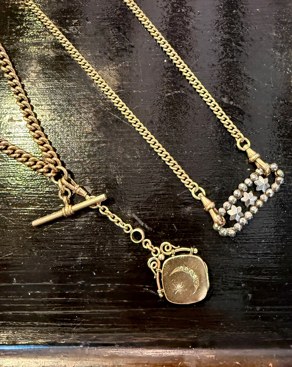 Thumbnail: Antique Albert chain with cut steel stars pendant