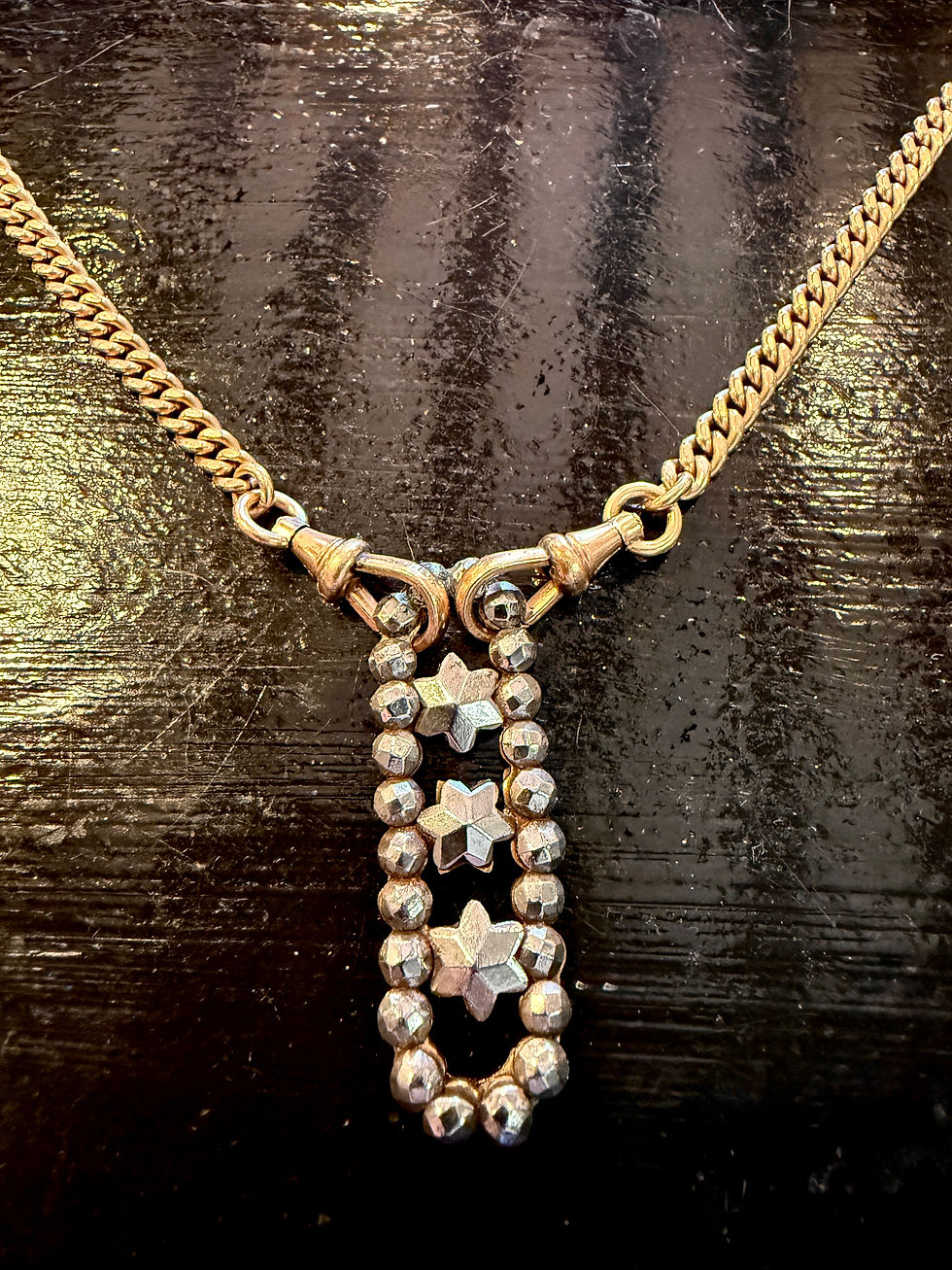 Thumbnail: Antique Albert chain with cut steel stars pendant