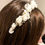 Thumbnail: Tiara with wax buds and net flowers