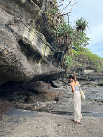 woman walks on the beach in Bali