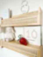 knitted decor carrot on bookshelf