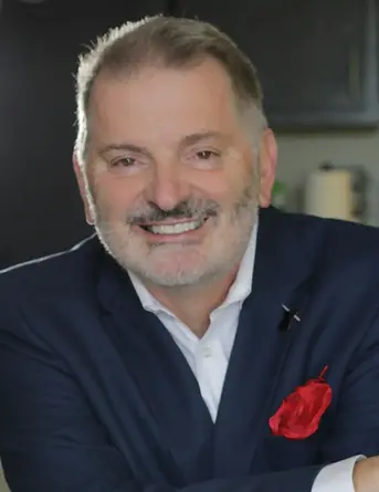 professional magician smiling in portrait for Sacramento birthday parties, school shows, and events