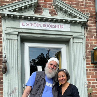  Ken Schoen and author Jessica outside Schoen's Booksstore