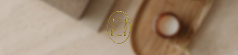 Gold abstract symbol on blurred background.