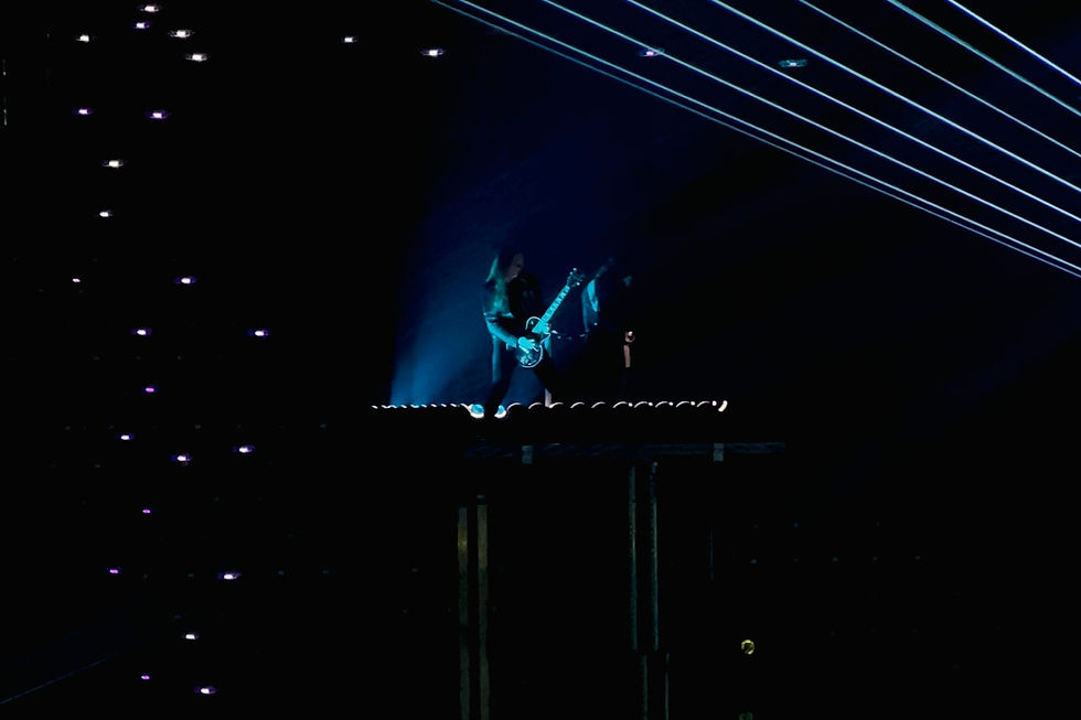 Drones fly above Trans-Siberian Orchestra performers during their 2025 tour. Drones by Illuminate Drones.