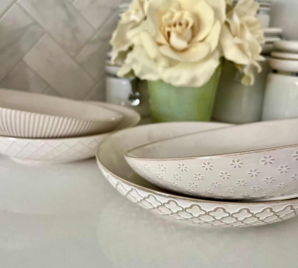 Thumbnail: Getstar Ceramic Paata Bowls set of 4 on kitchen countertop stacked in pairs to show all 4 designs.