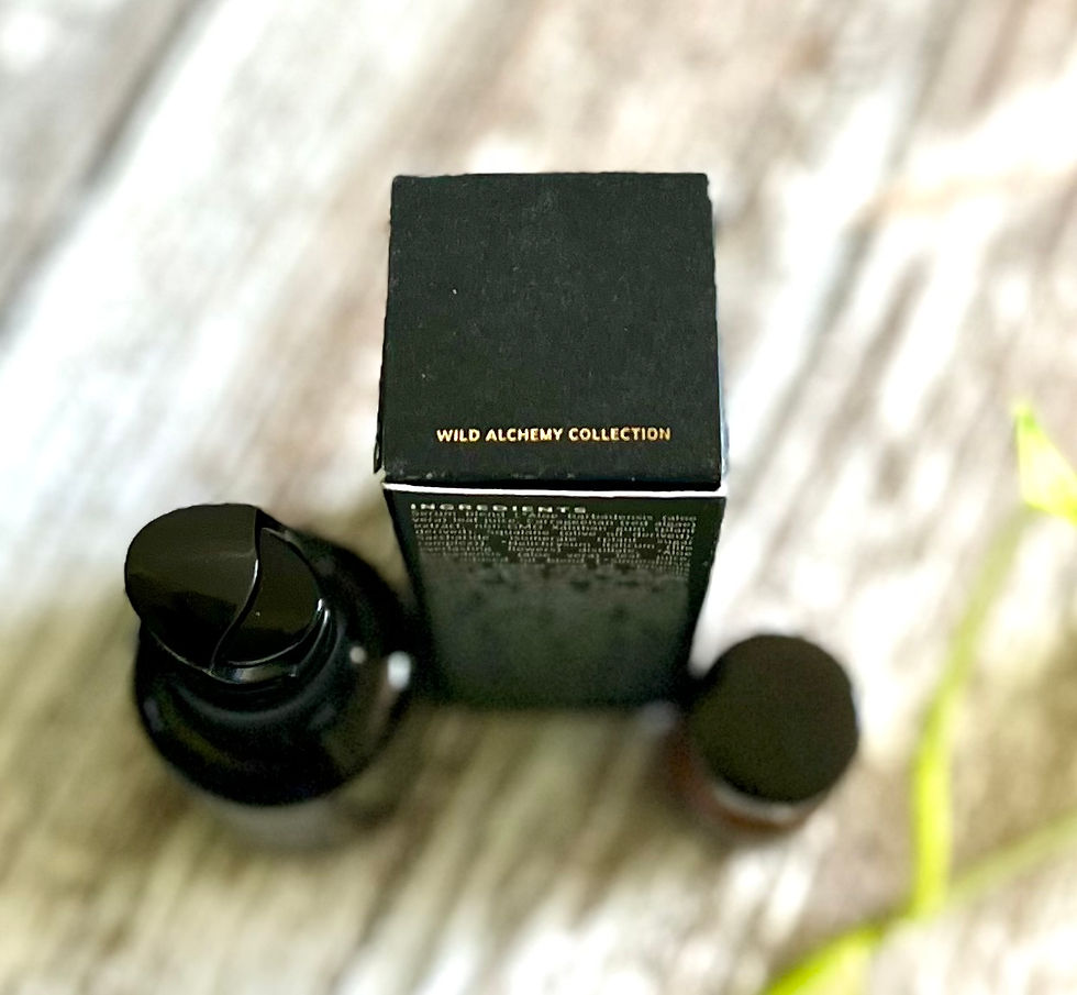 Annemarie Restorative Facial Cream glass bottle w/ pump & packaging box on whitewashed wood bird's eye view.