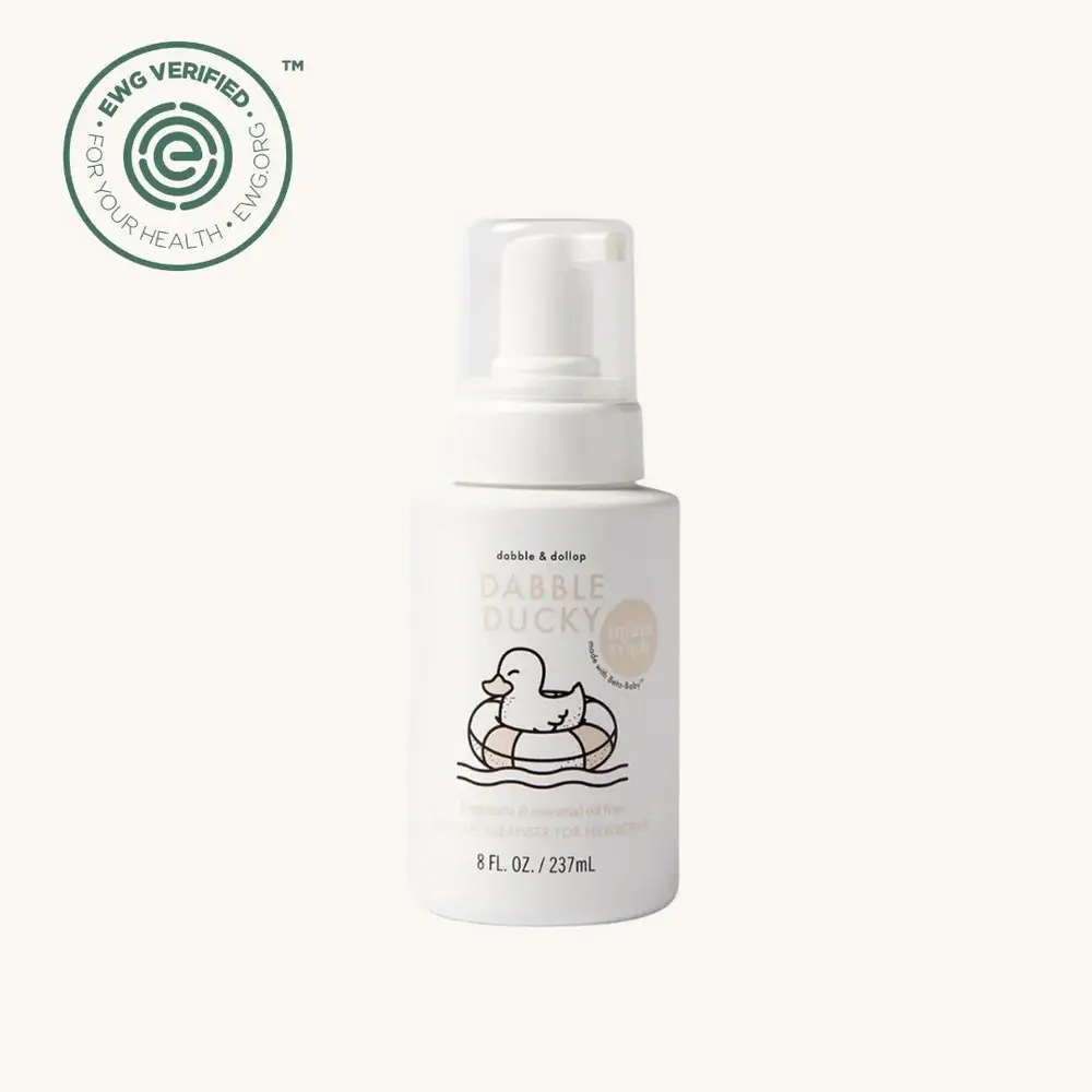 Dabble & Dollop Fragrance-Free Foaming Body Wash. 8oz bottle with logo and duck in a floaty image.