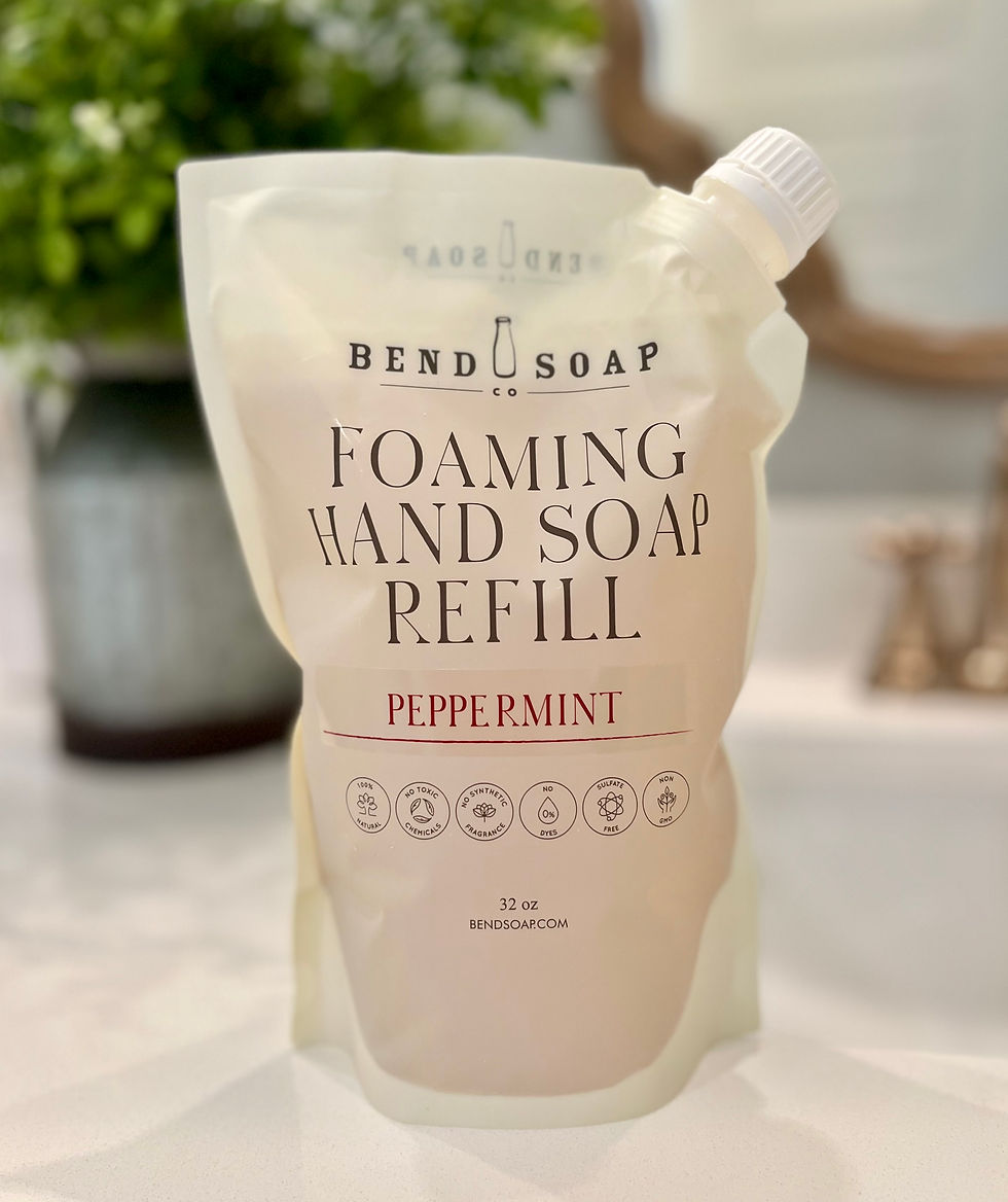 Thumbnail: Bend Soap Co. Foaming Hand Soap Peppermint refill pouch sitting on vanity countertop.
