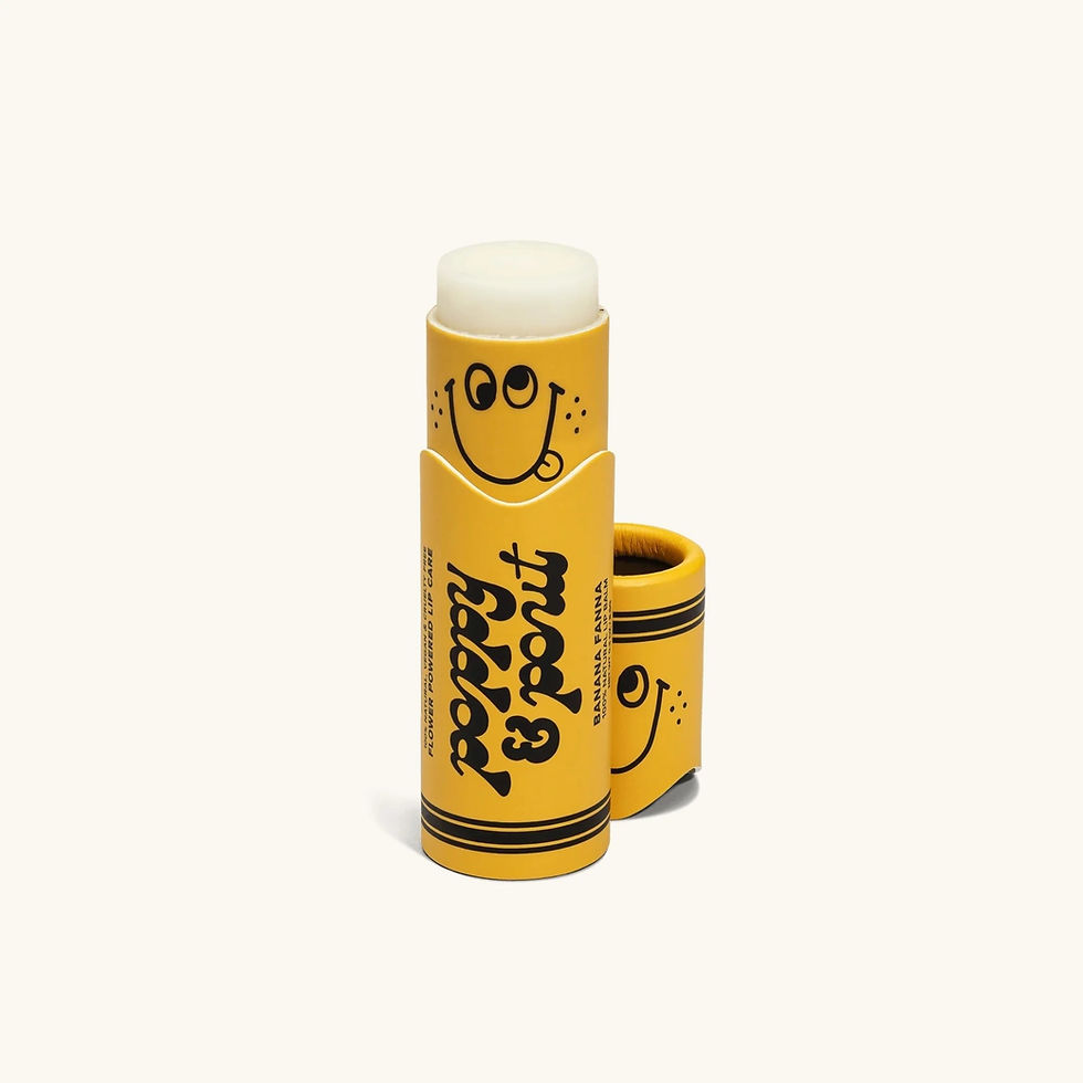 Thumbnail: Poppy & Pout Banana Fanna Kids Lip Balm Tube. Logo and smiley face.