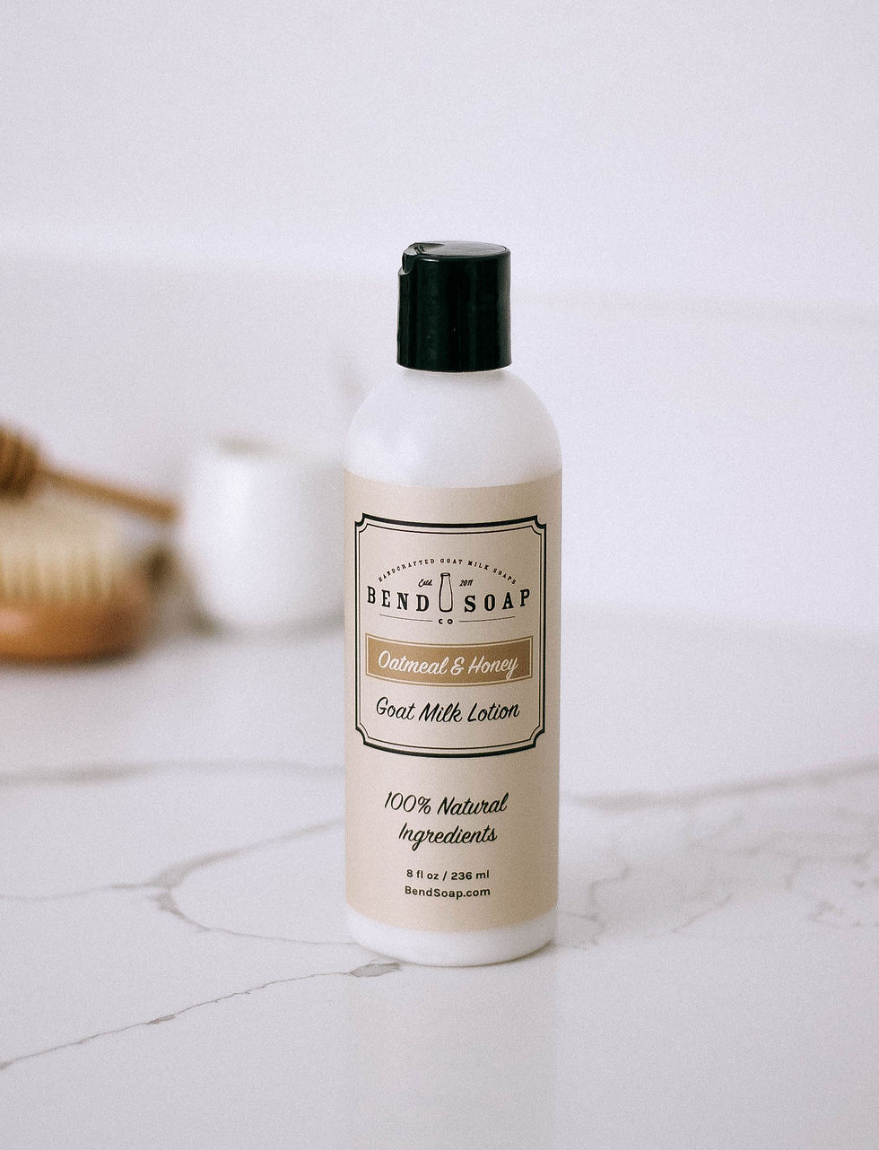 Thumbnail: Bend Soap Co. Oatmeal & Honey Goat Milk Soap Lotion bottle on white marble