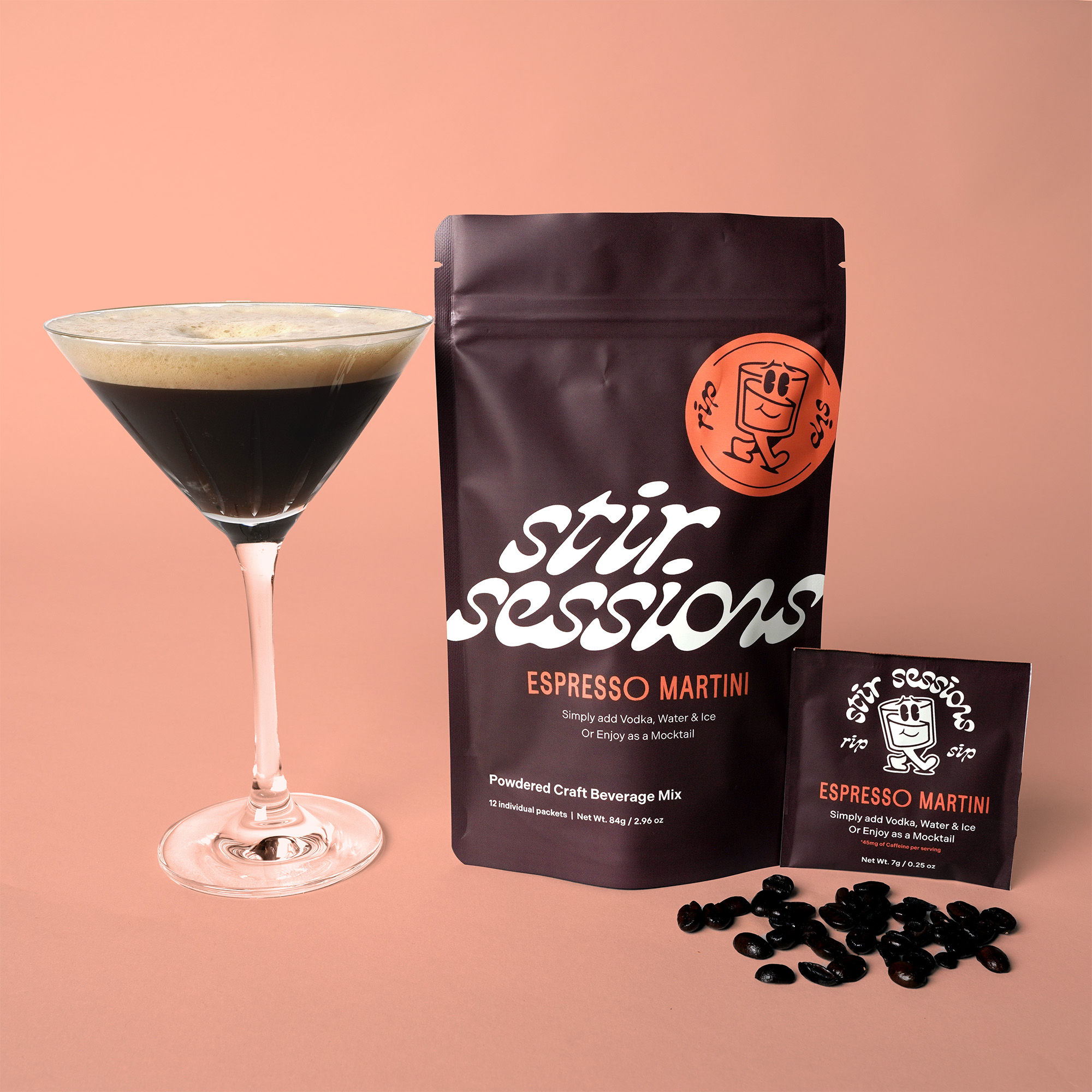 Stir Sessions Craft Beverage Mix Espresso Martini 12 Pack displayed with mixed drink and coffee beans.