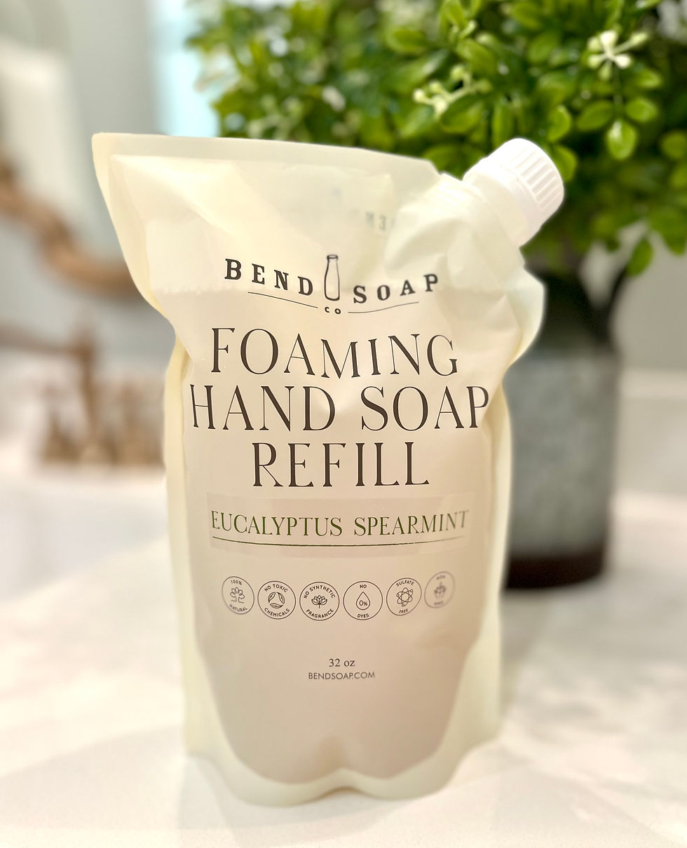 Thumbnail: Bend Soap Co. Foaming Hand Soap Eucalyptus Spearmint refill pouch sitting on vanity countertop.