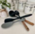 Variety of silicone kitchen utensils by Staub, Dioycli, and Vovoly.