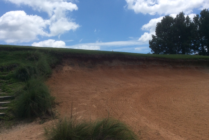Bunker guarding ninth green