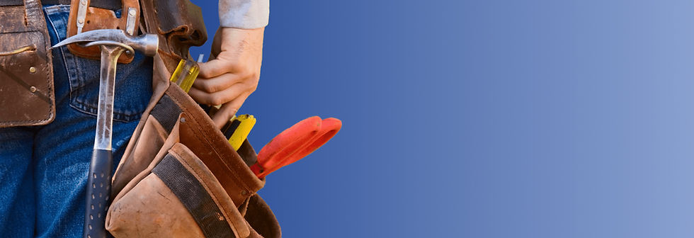 A man wearing a tool belt full of tools.