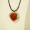 Thumbnail: Collier Coeur Transparent Reflets Rouges et Verts