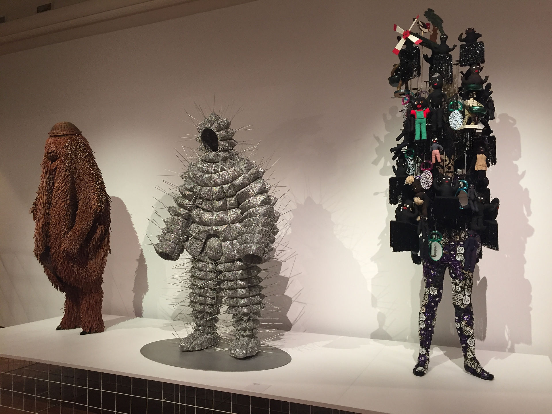Display of concealing bodysuits