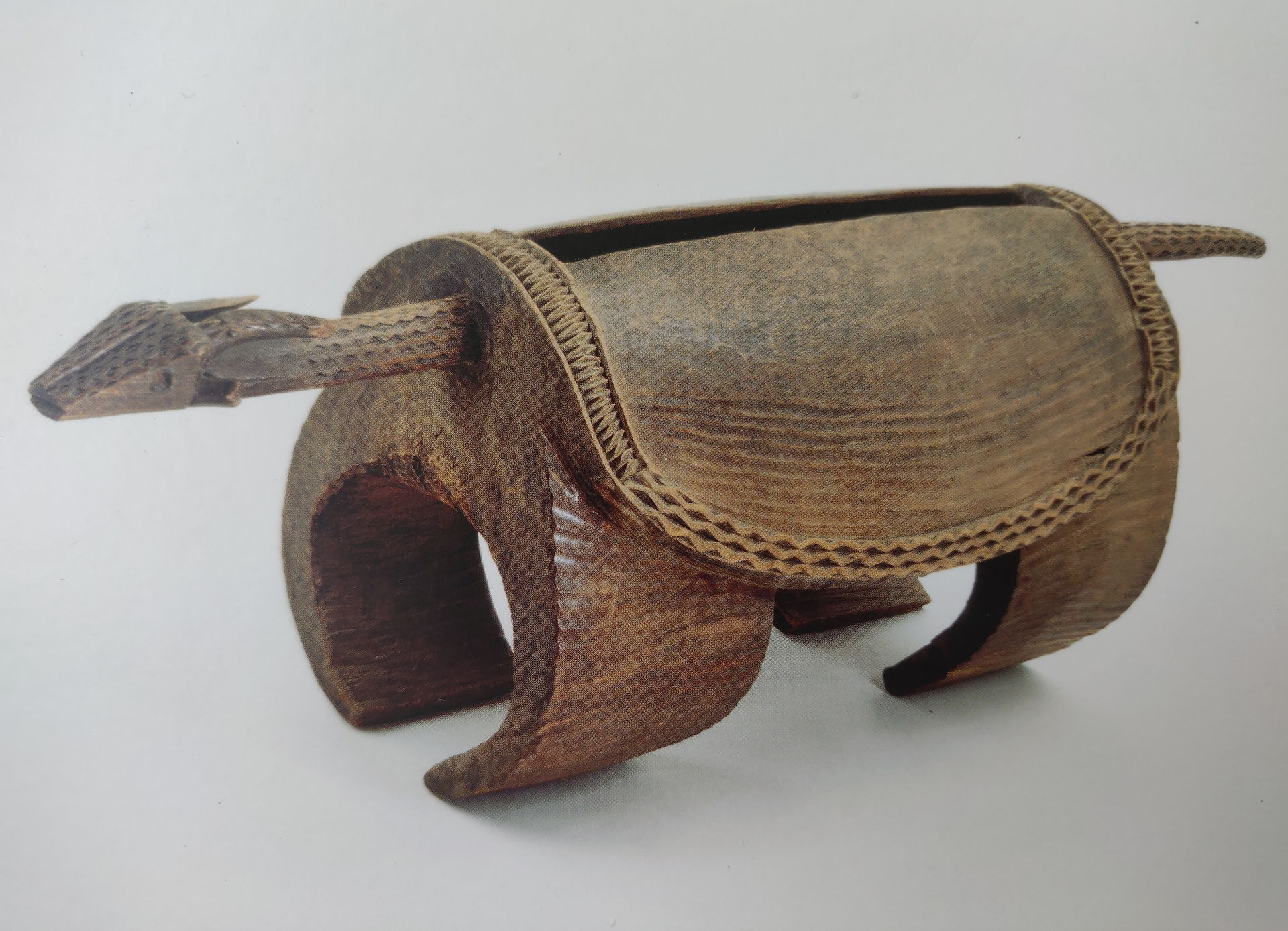 Zoomorphic Slit or Talking Drum