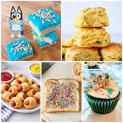 Array of colorful snacks: blue frosted squares, cheesy biscuits, pigs in blankets, fairy bread, and a cupcake. Cartoon dog character.