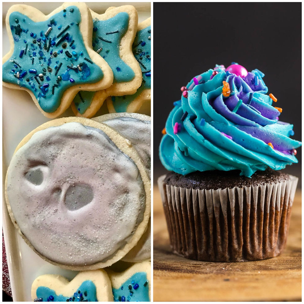 Star and moon cookies with blue icing and sprinkles. A chocolate cupcake with blue-purple icing and colorful sprinkles on a wooden surface.