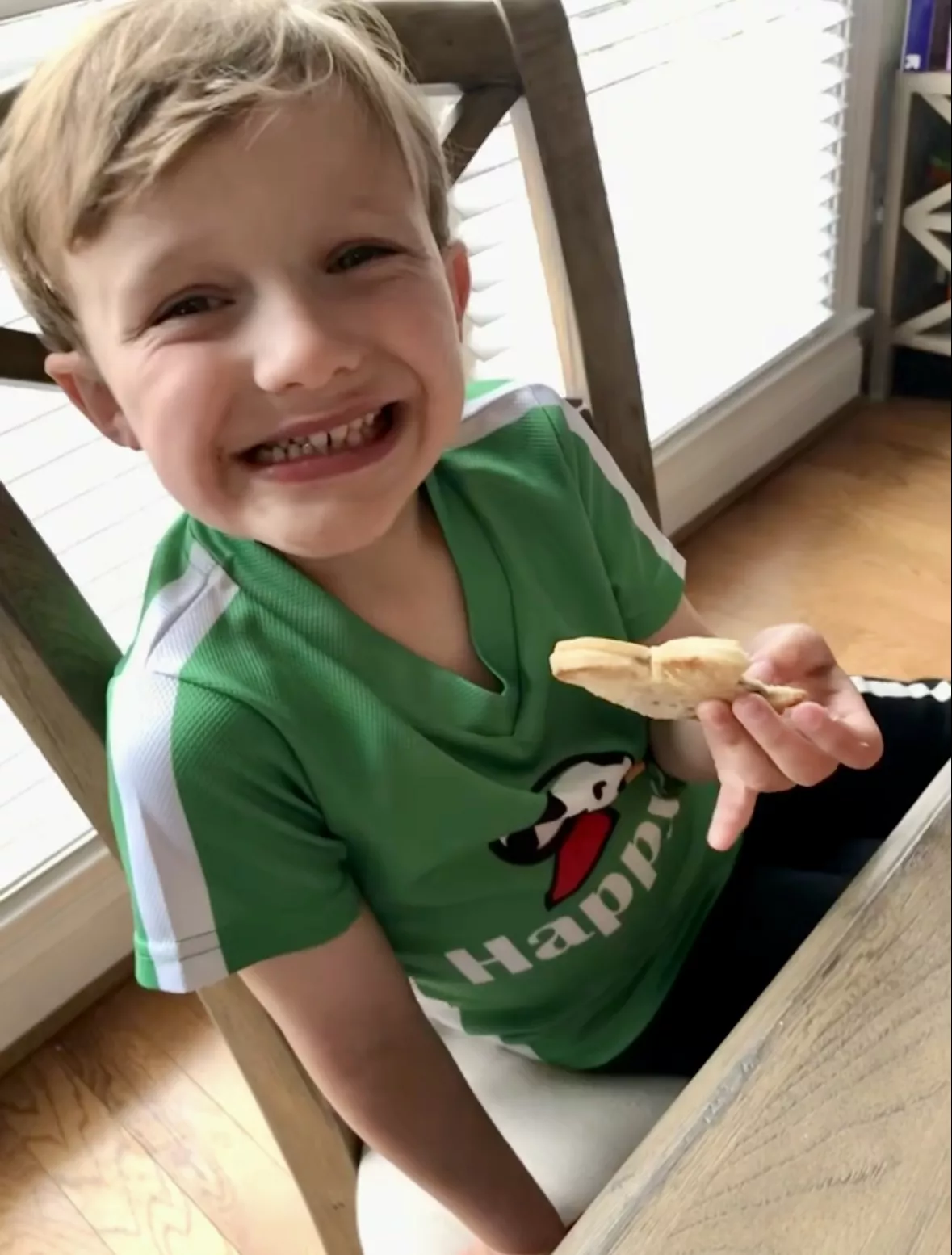 child holds a hand pie