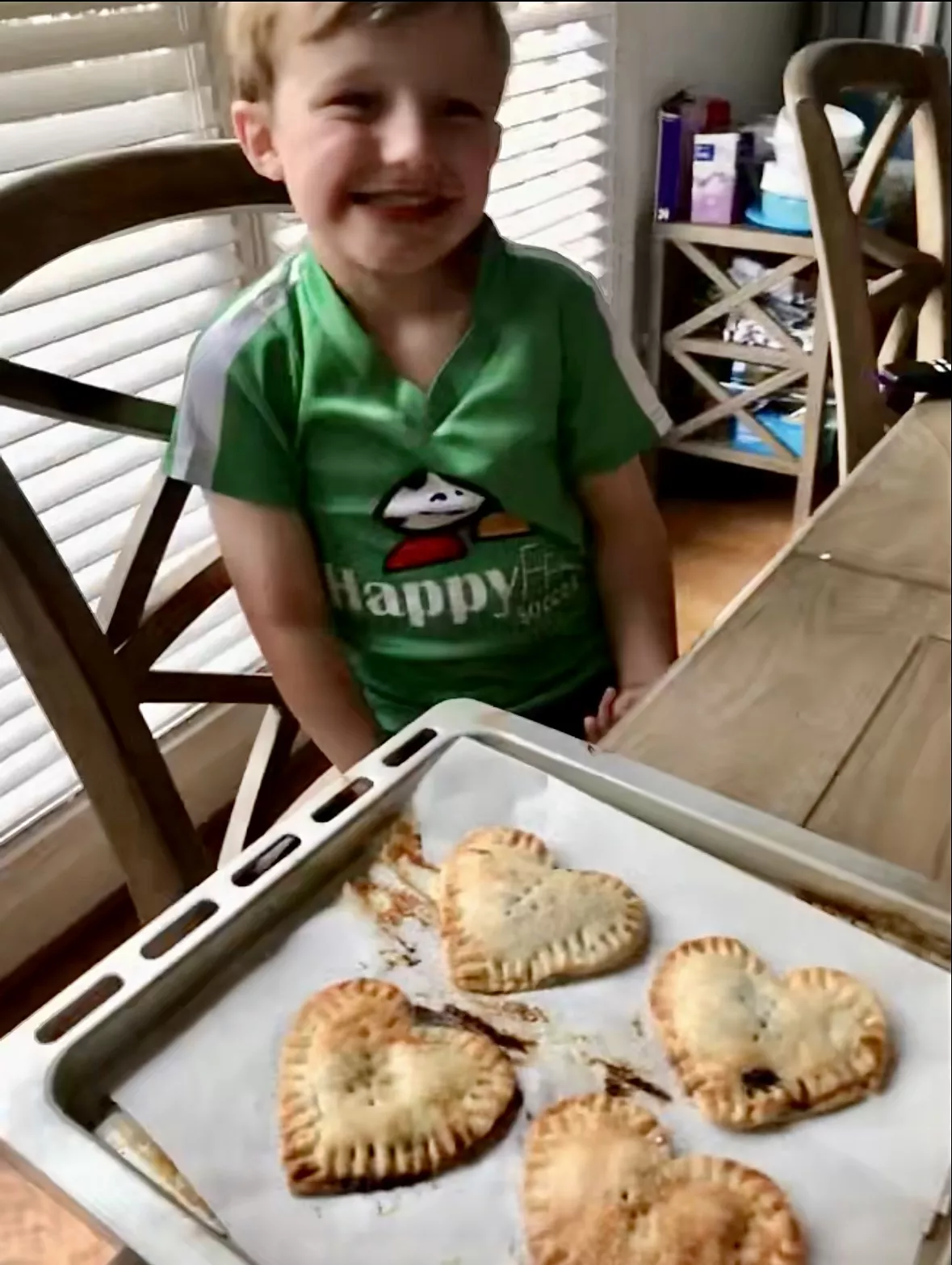 heart shaped hand pies on cookie sheet