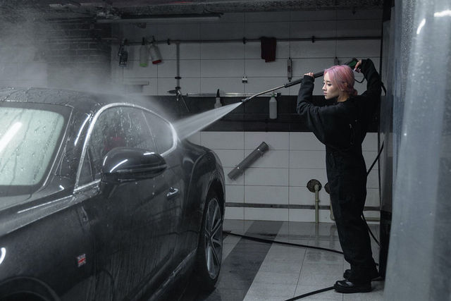 Foam pre-wash being applied to a car at MintGroom