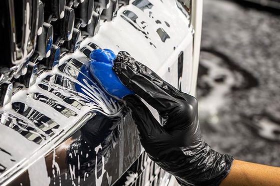 Clay bar decontamination during a MintGroom car spa treatment