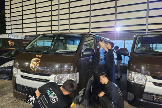 Waterless cleaning of a UPS Singapore delivery vehicle
