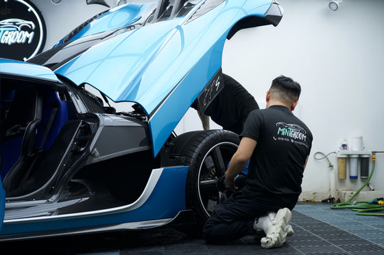 CARPRO Immortal paint protection film being installed on a car at MintGroom